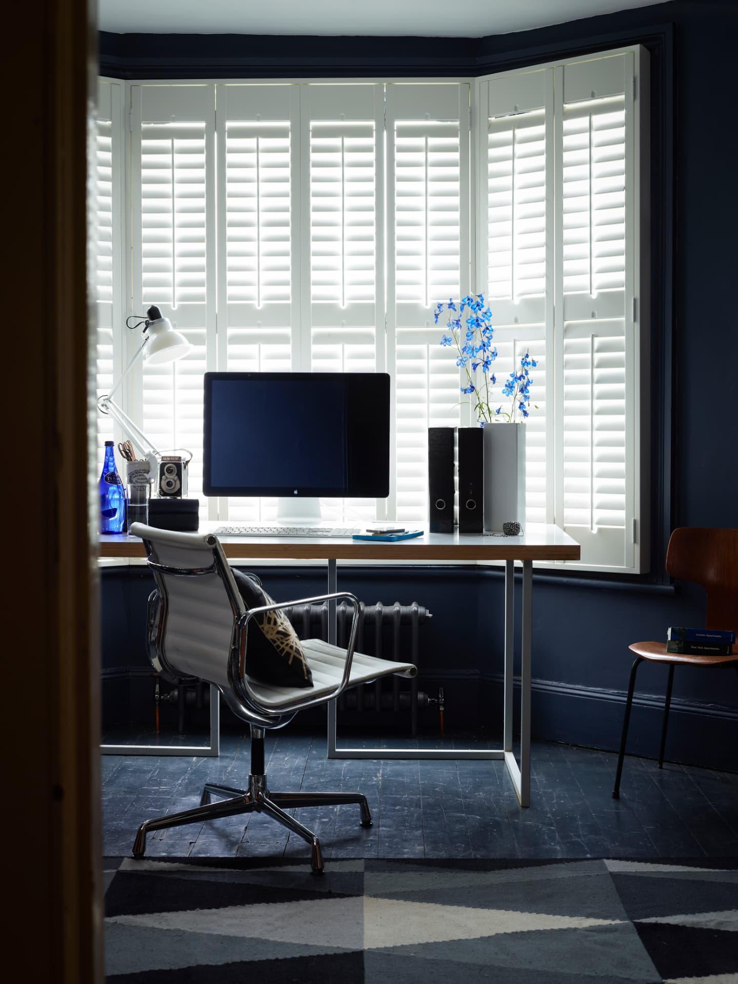 Bay window shutters in a commercial setting